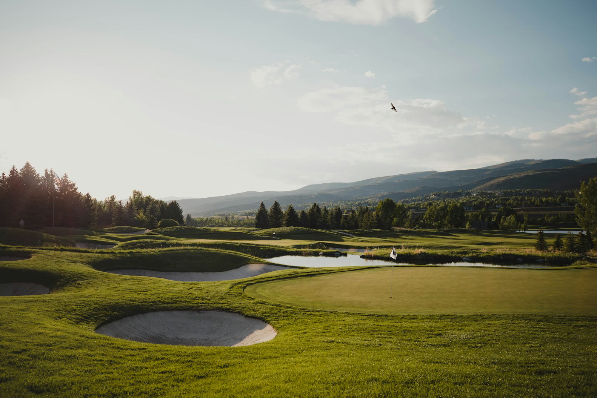 A golf course fairway at golden hour, generic stock photo pending real venue photography.